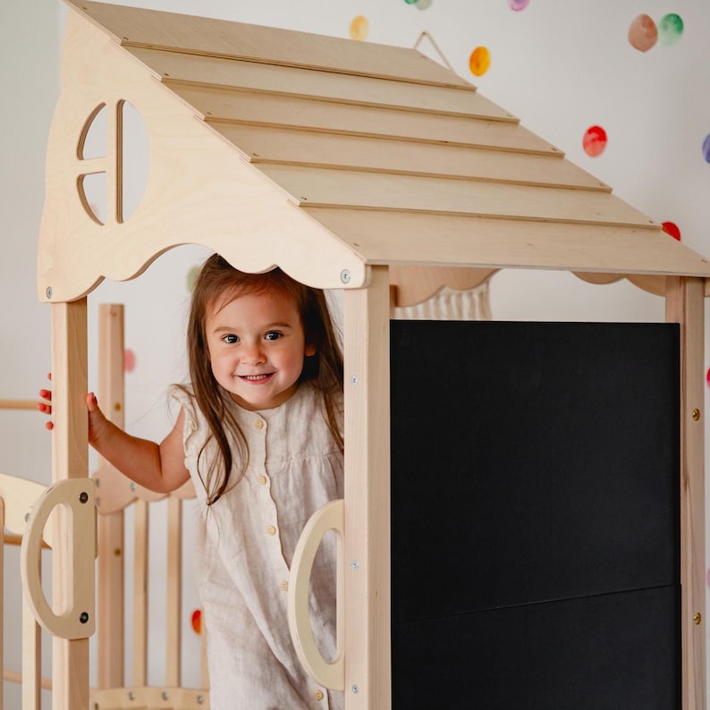Indoor playground product image showing playhouse and ramp layout.